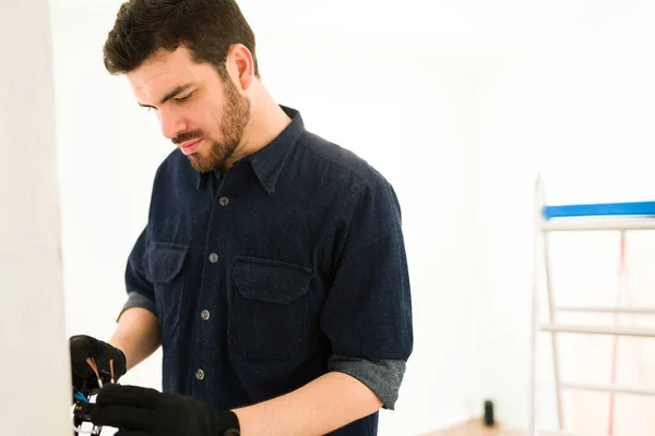 Handyman Homeowner Safety Gloves Repairing Himself Light Switch Electrical System — Stockfoto