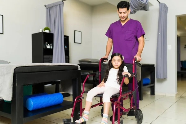 Sad Elementary Girl Coming Physiotherapy Clinic Wheelchair Because Leg Injury — Stock Photo, Image