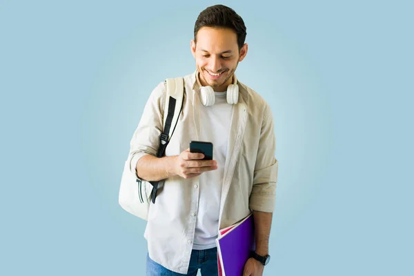 Handsome Male College Student Texting His Smartphone College While Carrying — Stock Photo, Image