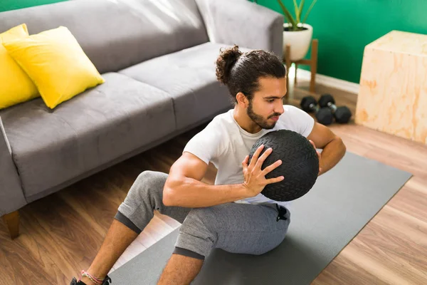 Latin Young Man Exercising Doing Abs Crunches While Holding Fitness — Stock Photo, Image