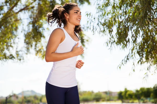 Girl running outdoors — Stock Photo, Image