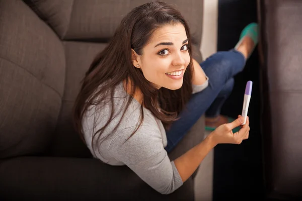 Young woman with pregnancy test — Stock Photo, Image