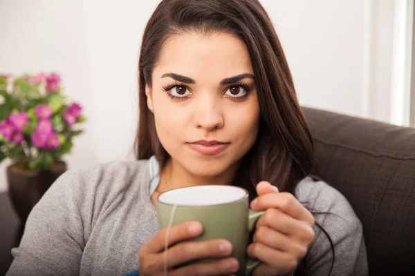 Woman with hot tea — Stock Photo, Image