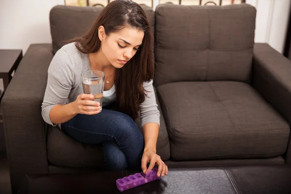 Woman with pill organizer — Stock Photo, Image
