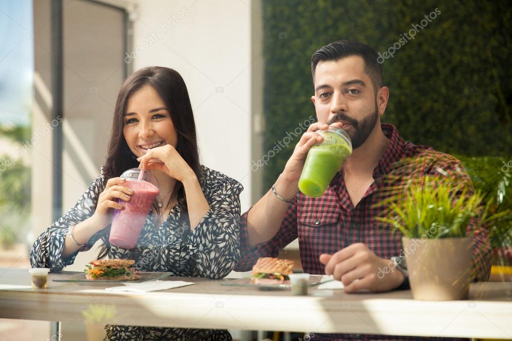 couple having some smoothies