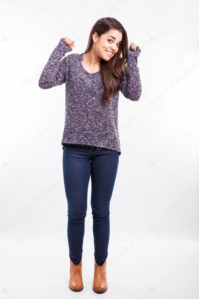 Woman raising her arms