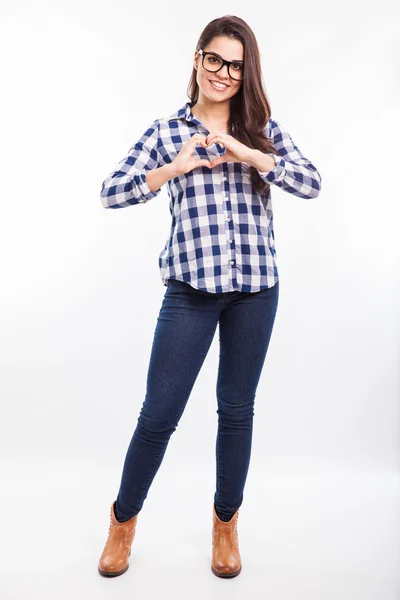 Woman making a heart sign — Stock Photo, Image