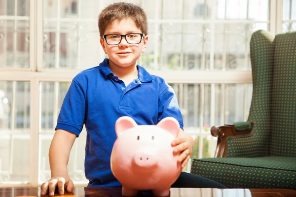 Glasses holding all of his savings — Stock Photo, Image
