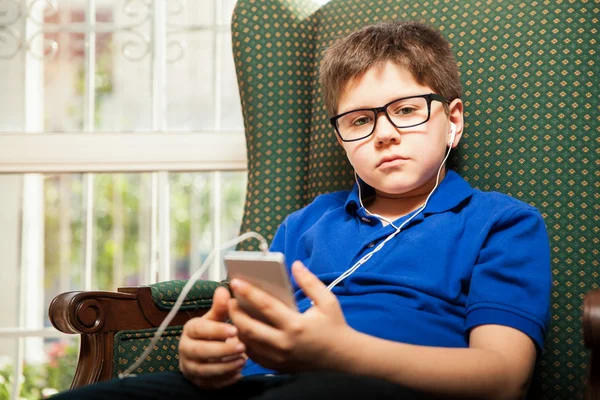 Little boy listening to music — Stock Photo, Image