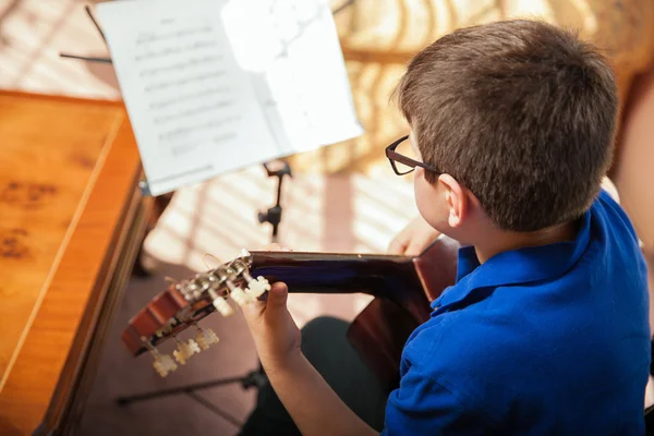 Blond boy practicing song — Stock Photo, Image