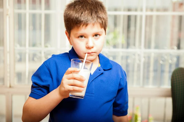 Kid drinking his milk — Stock Photo, Image