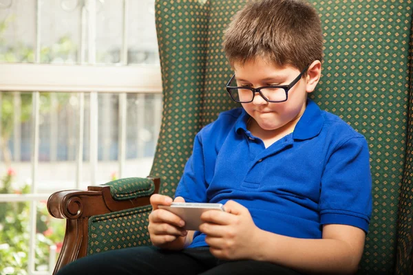 Boy playing games — Stock Photo, Image