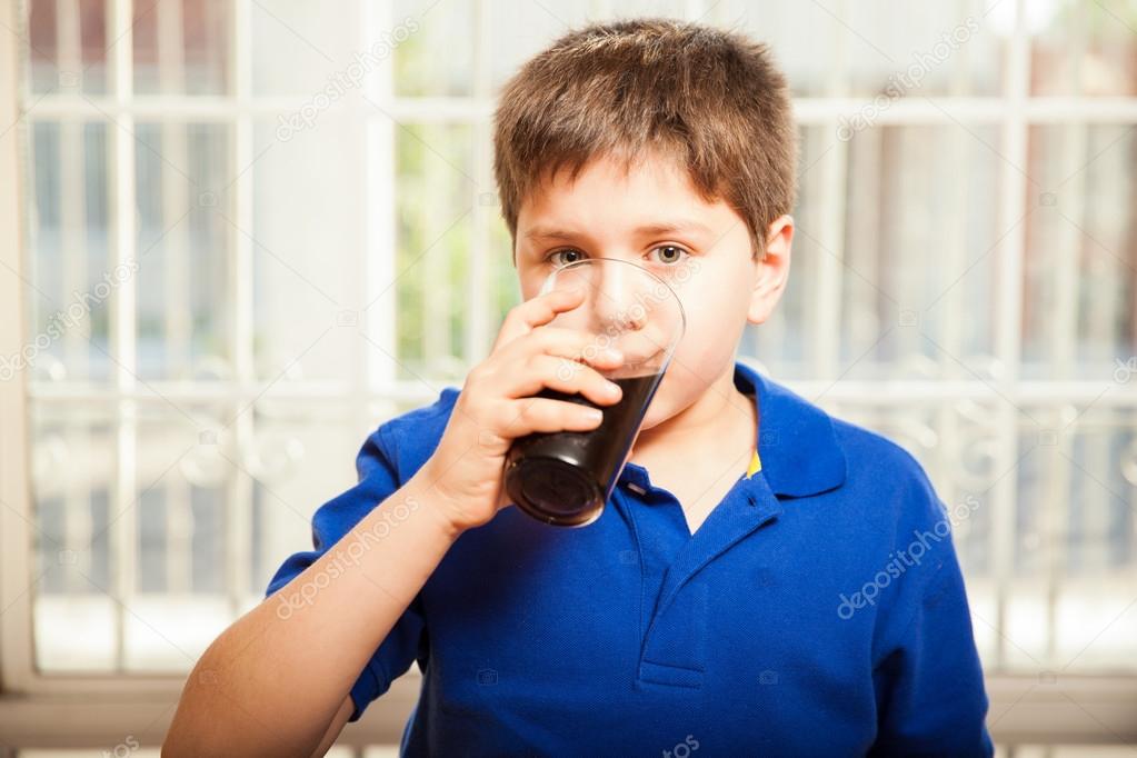 boy drinking soda