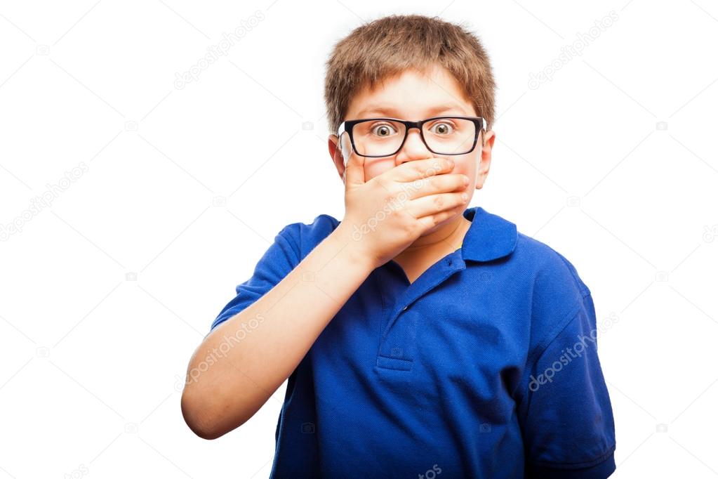 boy covering his mouth