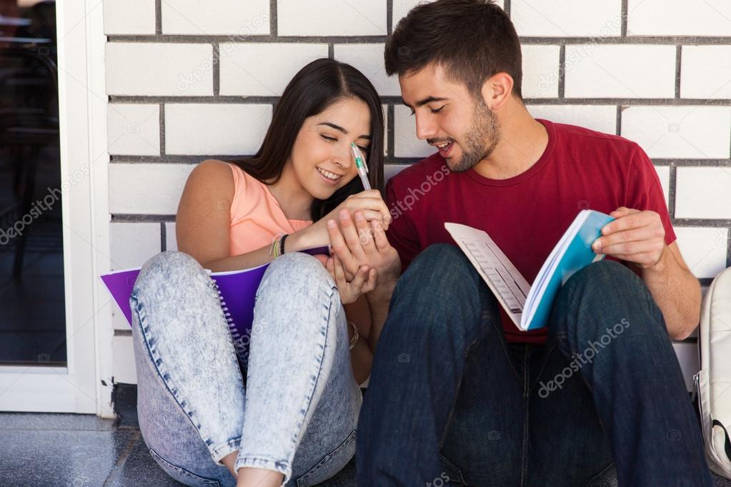 Brunette writing her phone number