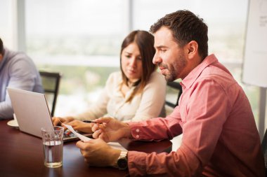 colleagues dressed casually  working