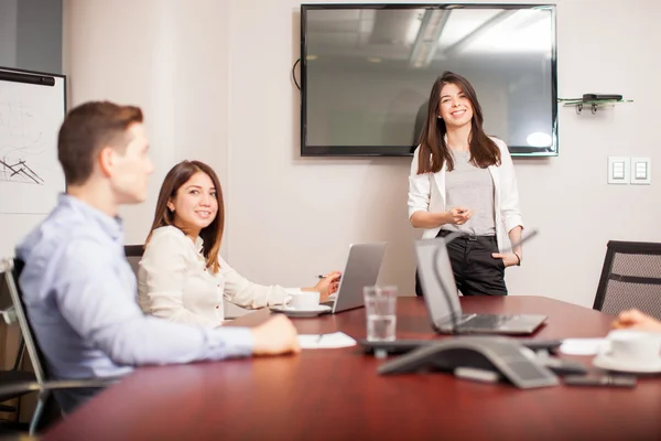 Woman giving a business presentation — Stock Photo, Image