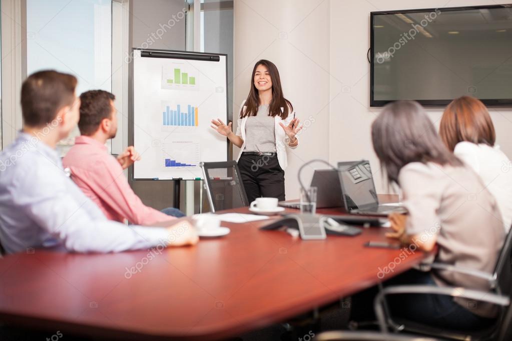 brunette giving a business presentation