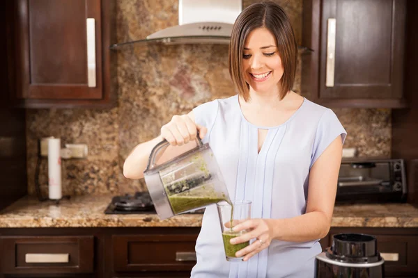 Woman about to drink  juice — Stock Photo, Image