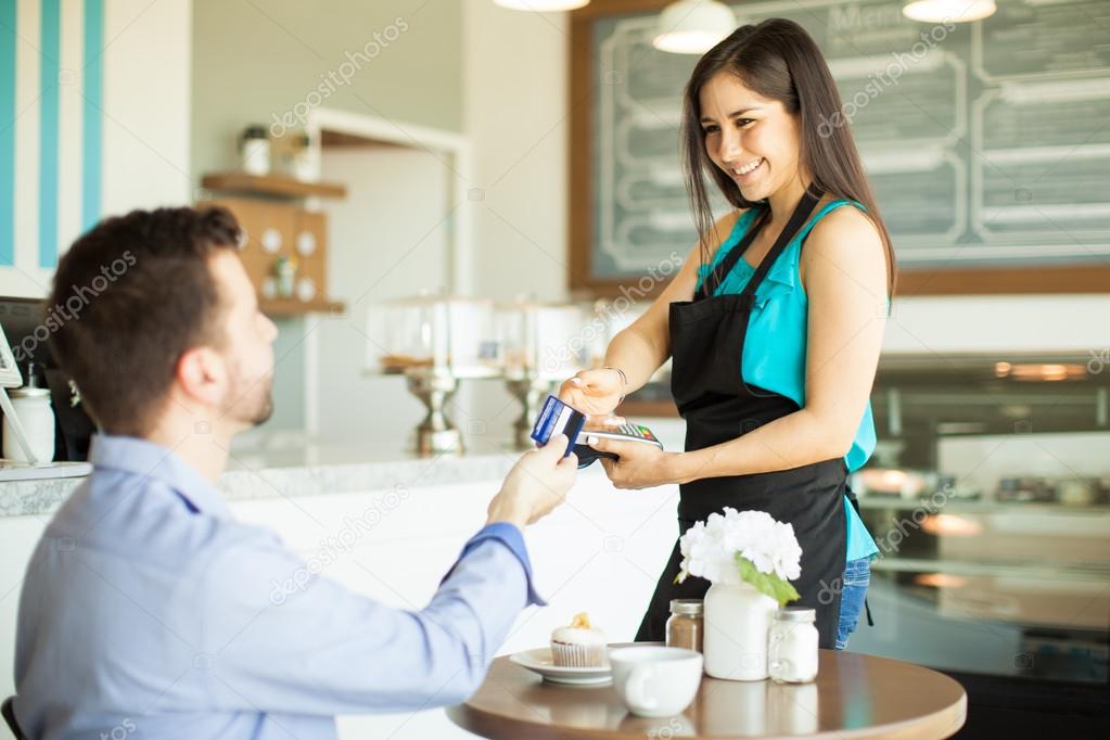waitress taking a credit card