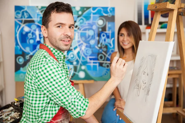 Hispanic artist drawing a sketch — Stock Photo, Image