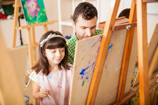 Teacher helping student — Stock Photo, Image