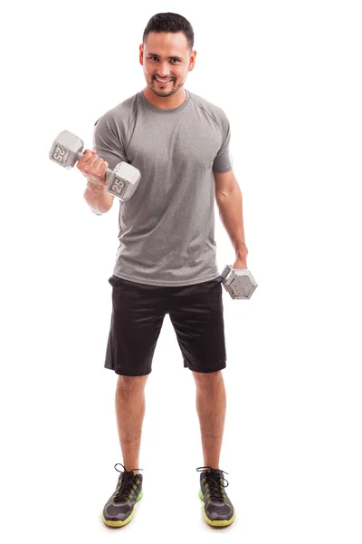 Man doing bicep curls — Stock Photo, Image