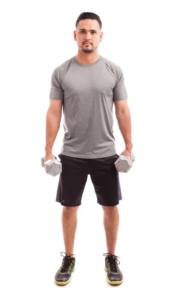 Man lifting a couple of dumbbells — Stock Photo, Image