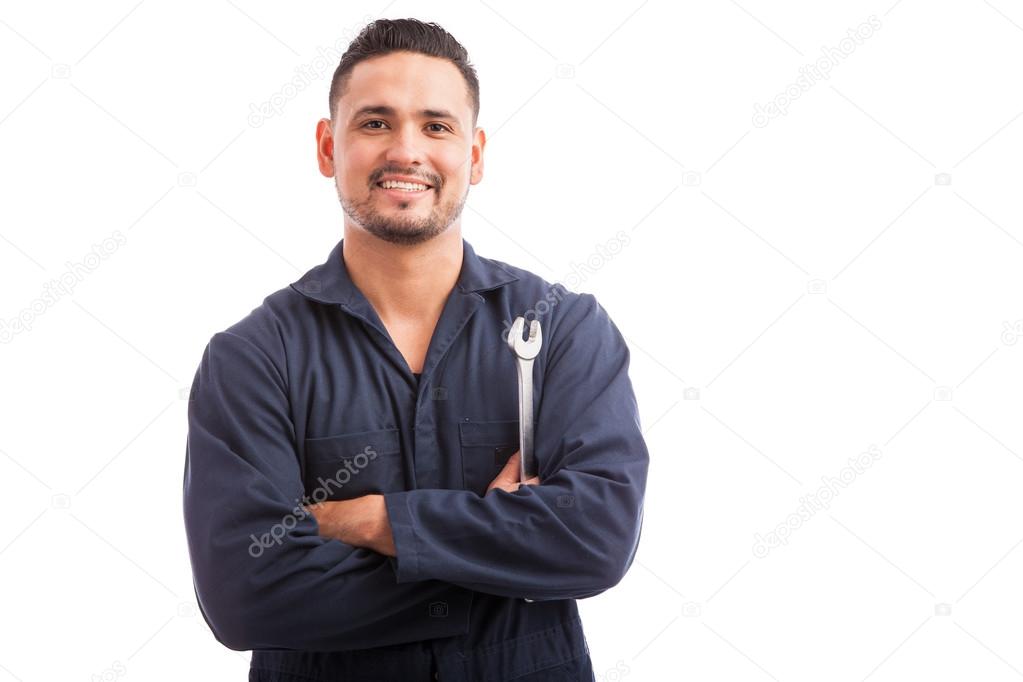 mechanic holding a wrench