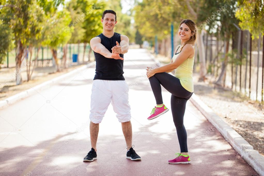 couple doing some stretching exercises