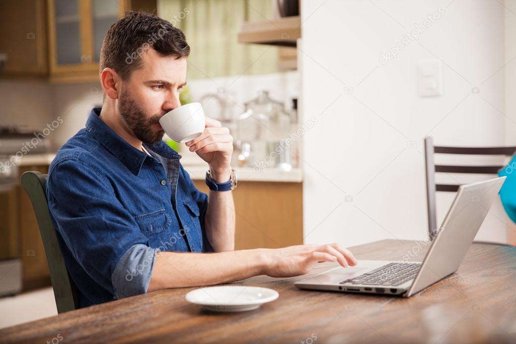 man using a laptop computer