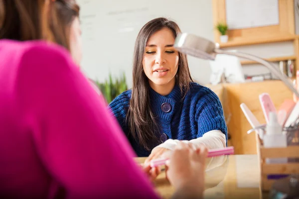 Woman getting her nails done — Stock Photo, Image