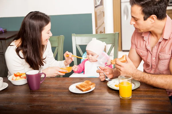 Parents eating breakfast — Stock Photo, Image