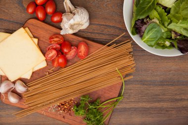 pasta, tomatoes, cheese, onions