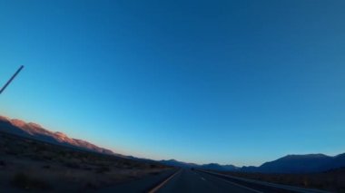 Scenic Route 395 in California, USA. View of the road from the driver's meta.