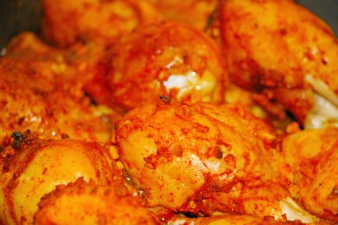 Bright pieces of baked chicken in the oven. Delicious homemade food