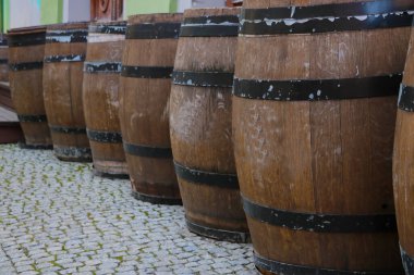 Large wooden barrels for alcohol. Storage of alcoholic beverages