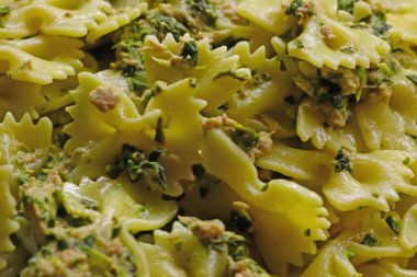 Blurred background, out of focus. Cooked spiced pasta