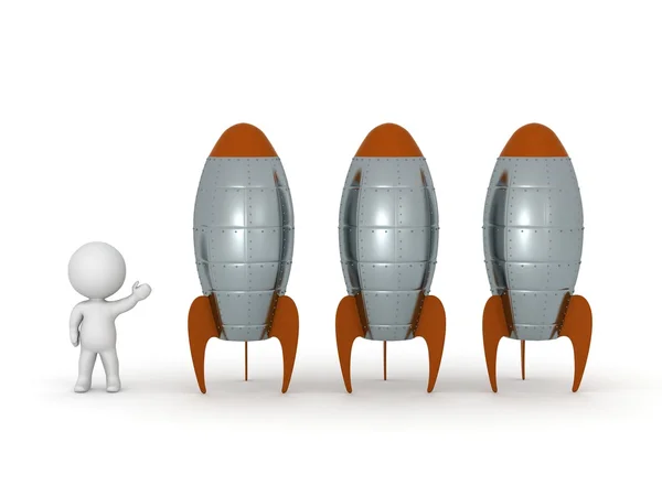 3D-karaktär visar tre raketer — Stockfoto