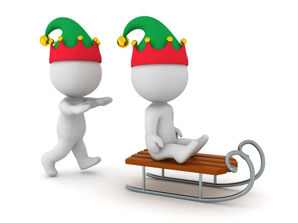 3D Character with Elf Hat Pushing another 3D Character on a Sled — 图库照片