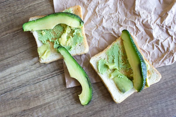 Tostadas Con Aguacate Una Mesa Madera Vista Desde Parte Superior — Foto de Stock