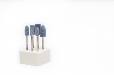 Donanım manikürü ve pedikür için kesiciler. Aksesuarlar ve manikür aleti. Manikür için değirmen kesicisi. Boşluk konseptini kopyala