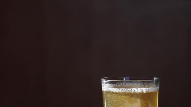 Macro Shot Of Pouring Light Beer Into Glass — Stock Video