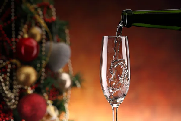 Pouring sparkling wine — Stock Photo, Image