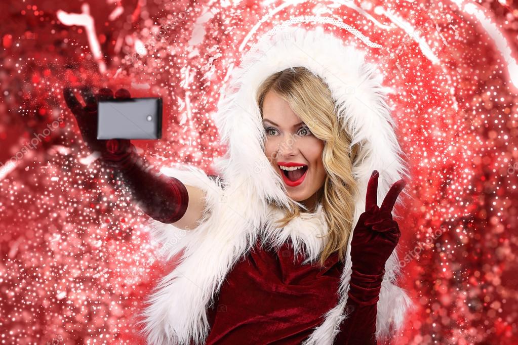 Christmas girl doing selfie