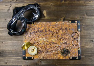 Steampunk paslı grunge çerçeve, havacı gözlükleri, pusula, perçinler. Güzel kopyalama alanı.