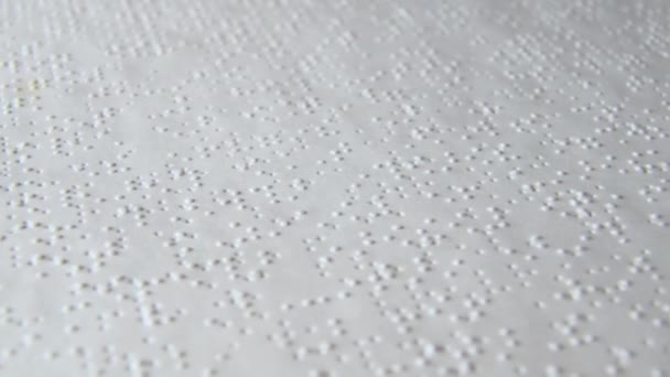 Braille Alphabet Printed Paper Rotating Full Screen Low Depth of field DOF bokeh — 비디오