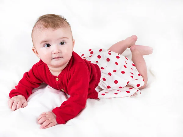 The child in bright clothes Stock Picture