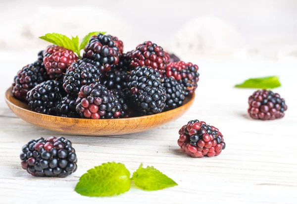 Bunch of wild berries and mint — Stock Photo, Image