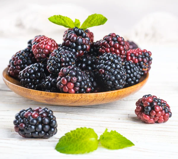 Bunch of wild berries and mint — Stock Photo, Image